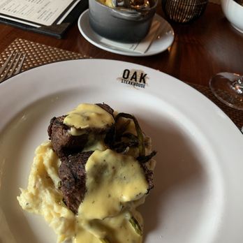 Oak Steakhouse - Petite filet with asparagus and mashed potatoes - Steakhouses Near Me - Raleigh, North Carolina Oak Steakhouse - Petite filet with asparagus and mashed potatoes - Steakhouses Near Me - Raleigh, North Carolina