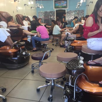 Sun Nails - cramped walkway to the the polish selection but luckily there is a variety of polishes to choose from - Nail Salons Near Me - Los Angeles, California Sun Nails - cramped walkway to the the polish selection but luckily there is a variety of polishes to choose from - Nail Salons Near Me - Los Angeles, California