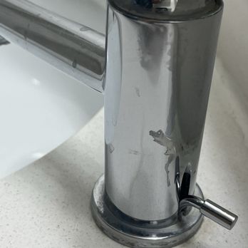 Hampton Inn & Suites Blythe - Toothpaste glob in back of sink faucets. Grime around base of faucet. - Hotels Near Me - Blythe, California