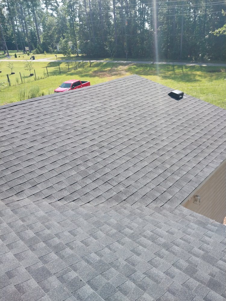 Slide of Tyndal Roofing