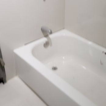 Firmino Construction - a white bathtub in a bathroom - General Contractors Near Me - Hillside, New Jersey
