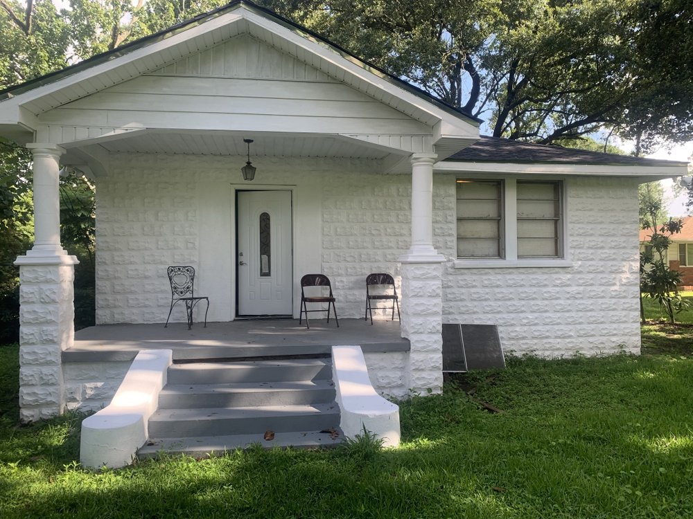 Slide of A&E Construction & Roofing Group