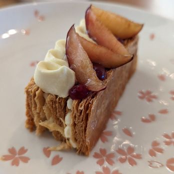 Knife Pleat - Chef's special. Pastry with a wonderful cream laced in and plums on top - French Near Me - Costa Mesa, California Knife Pleat - Chef's special. Pastry with a wonderful cream laced in and plums on top - French Near Me - Costa Mesa, California