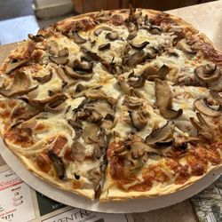 The Washington Pizza House - Mushrooms, onions, and pepperoni pizza