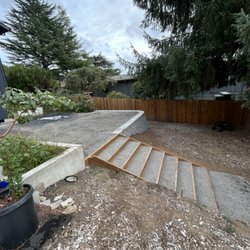 AG General Contractor - Retaining wall with pressure treated wood steps