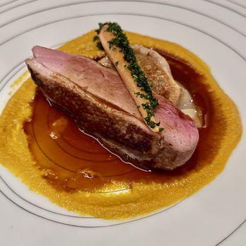 Umi By Vikram Garg - Duck & Foie Gras. Koji aged Muscovy duck breast, foie gras gyoza, carrot orange gastrique. - Seafood Near Me - Honolulu, Hawaii