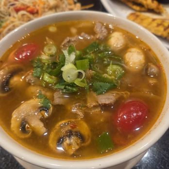 Jaded Thai - Tom yum noodle soup with beef, papaya salad, and chicken satay. - Thai Near Me - Hoffman Estates, Illinois