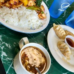 New Oriental Star - The side was sweat and sour soup.  They have a decent one.  I think I like their won ton soup better. Their egg drop is good.