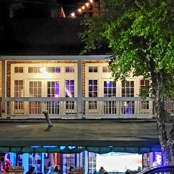 Reel Cafe - the outside of the restaurant at night - American Near Me - Wilmington, North Carolina