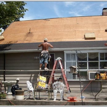 J & J Home Improvements - two men working on a roof - General Contractors Near Me - York, Pennsylvania J & J Home Improvements - two men working on a roof - General Contractors Near Me - York, Pennsylvania