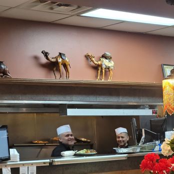 Malek Al Kabob - Taylor - Happy cooks ( with hair protection on!) - Mediterranean Near Me - Taylor, Michigan Malek Al Kabob - Taylor - Happy cooks ( with hair protection on!) - Mediterranean Near Me - Taylor, Michigan