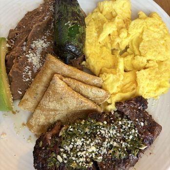 Q Kitchen | Bar - Steak (well done), scrambled eggs - Barbeque Near Me - San Antonio, Texas