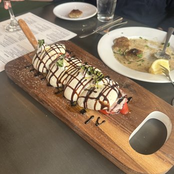 ITA Kitchen - Table side mozzarella served over roasted red peppers and prosciutto - Italian Near Me - Bay Shore, New York
