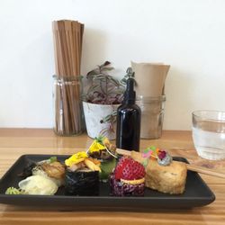 &Sushi - Lovely aesthetic; the soy sauce is dispensed using an eye dropper bottle