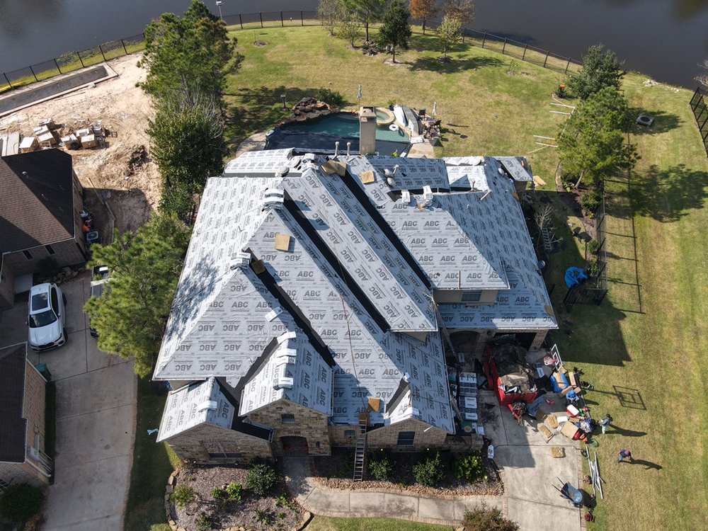 Slide of Pure Roofing