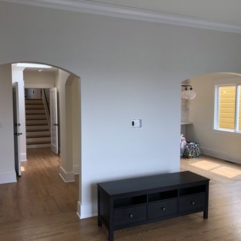Stonebridge Construction - a living room with hardwood floors - General Contractors Near Me - San Rafael , California