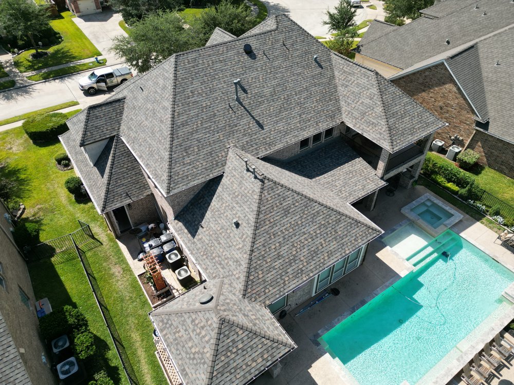 Slide of Core Four Roofing