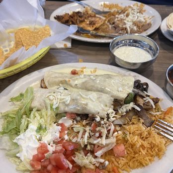 El Rodeo - I forgot to take a picture before eating. I had Texas burritos and my husband has the chori pollo. - Mexican Near Me - Windsor, Virginia
