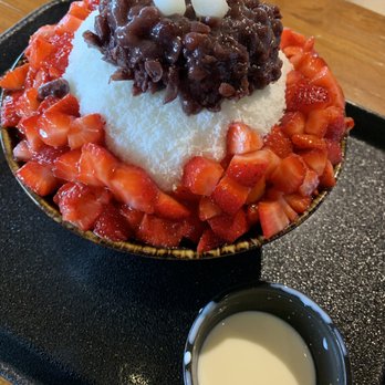 Cafe Clover - Strawberry bingsu (milk snow) with mochi and red bean, served with side of sweetened condensed milk (food insta: @aje.eats) - Desserts Near Me - Elkins Park, Pennsylvania