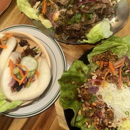 Duck fried rice, pork bao buns, chicken lettuce wraps