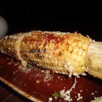 Norwegian Cruise Line - Elote with Cojita Cheese at Los Lobos - Travel Services Near Me - Downtown Miami, Florida