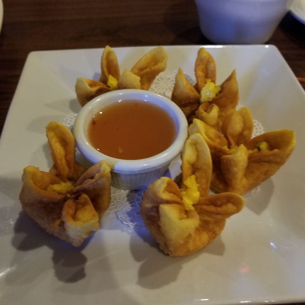 Charm Thai Kitchen and Sushi Bar - Crab angels.  Should be cream cheese and imitation crab meat but it has a strong Curry taste to me - Sushi Bars Near Me - Mobile, Alabama