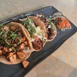 Pollo asada, Barbacoa, and carne asada happy hour tacos