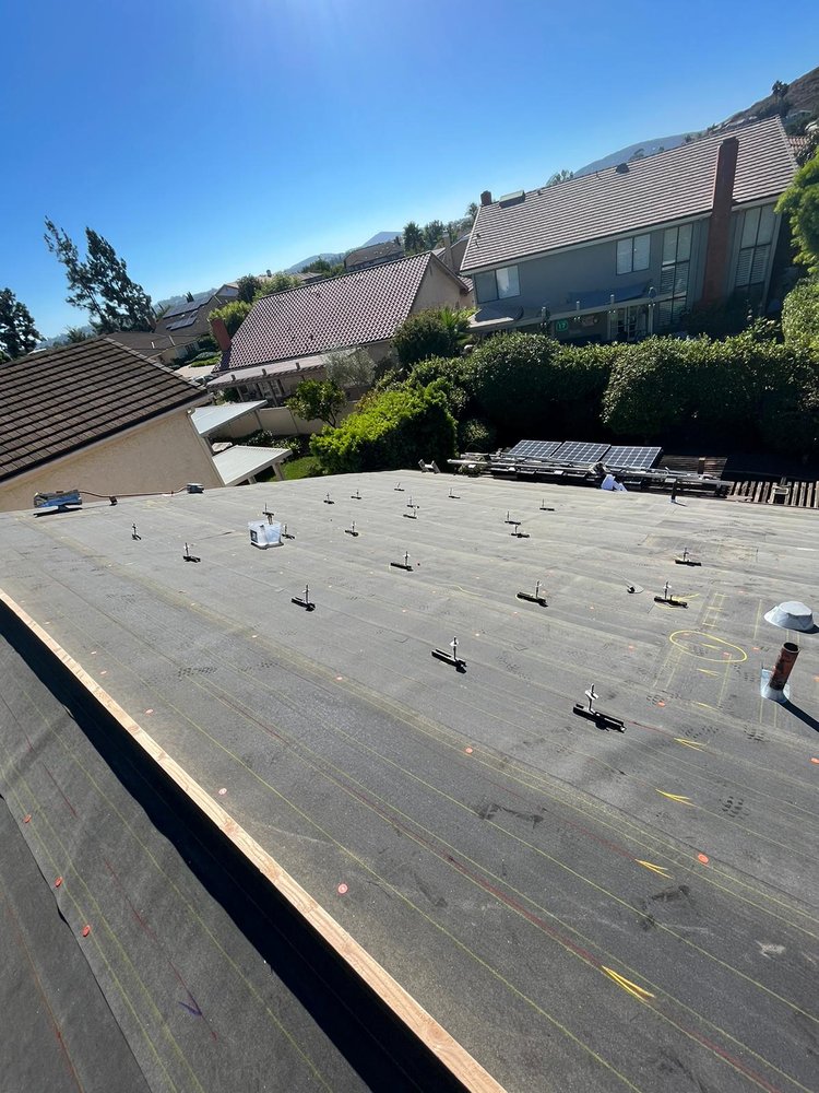 Slide of R & J Roofing