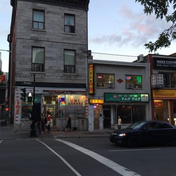Amigo - Second floor white bricks above the green sign - Chinese Near Me - Montreal, Quebec
