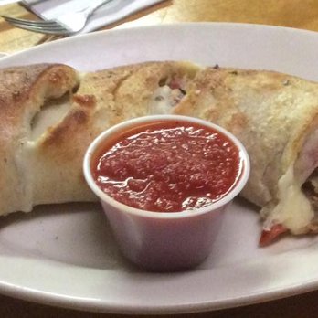 Reno's Pizza - Half of the huge Reno's Calzone suitable for 2 to 3 people, when whole. Reno's Pizza on Route 507 in Hawley, Pennsylvana. - Pizza Near Me - Hawley, Pennsylvania Reno's Pizza - Half of the huge Reno's Calzone suitable for 2 to 3 people, when whole. Reno's Pizza on Route 507 in Hawley, Pennsylvana. - Pizza Near Me - Hawley, Pennsylvania