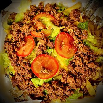 Fatboi Slims - a salad with tomatoes and lettuce - Burgers Near Me