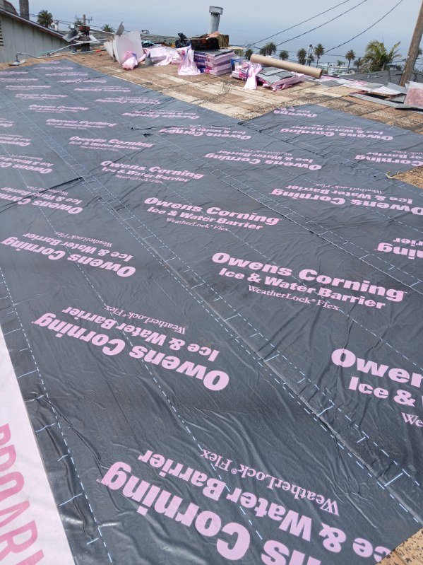 Slide of Reliance Roofing