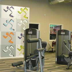 Anytime Fitness - Situp Machine. Aerobics room behind it.