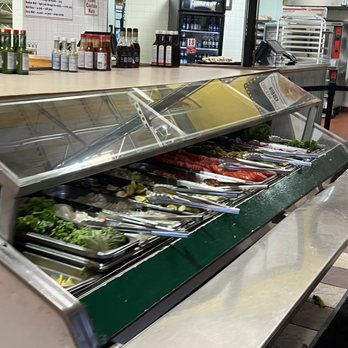 Fuddruckers - a buffet with a variety of food items - Burgers Near Me - Albuquerque, New Mexico
