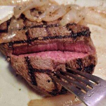 Texas Roadhouse - 8 oz sirloin. Supposed to be medium rare. The other side of the steak has no grill marks. - Steakhouses Near Me - Harrisburg, Pennsylvania