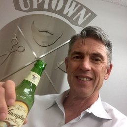 Enjoying a refreshing beverage before getting a haircut!  Thanks Mike!