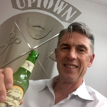 Uptown Barber Lounge - Enjoying a refreshing beverage before getting a haircut!  Thanks Mike! - Barbers Near Me - Bentonville, Arkansas