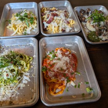 Patrizi's - Clockwise from upper left: Cacio e pepe; carbonara Alexandra; seared mushroom risotto; red sauce; and Leopold - Italian Near Me - Austin, Texas