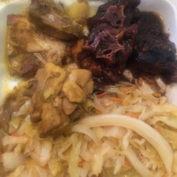 Oxtail curry chicken combo platter. Oxtail curry chicken combo platter.
