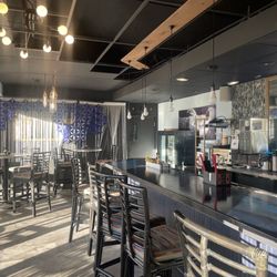 Orbit Lounge - Ample seating and vintage space themed decor!