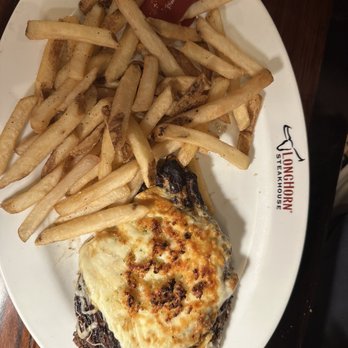 LongHorn Steakhouse - Outlaw Ribeye with Parmesan Cheese Crust with fries - Steakhouses Near Me - Tampa, Florida LongHorn Steakhouse - Outlaw Ribeye with Parmesan Cheese Crust with fries - Steakhouses Near Me - Tampa, Florida