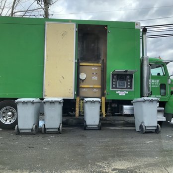 Clean Cut Shredding - Eye catching, green paper shredding truck parked in front of the building - Shredding Services Near Me - Rockville, Maryland Clean Cut Shredding - Eye catching, green paper shredding truck parked in front of the building - Shredding Services Near Me - Rockville, Maryland