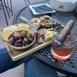 Nolan's Cigar Bar - Charcuterie, manhattan, and a stick