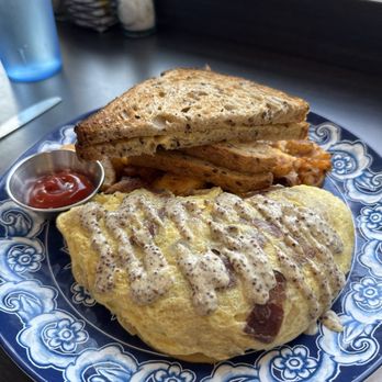 Taylor Sam's - Chefs special with smoked bacon onions and drizzle of Dijon mustard. - Breakfast & Brunch Near Me - St. Petersburg, Florida