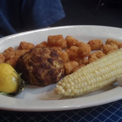 Skipjack's - Tuesday night crab cake special: one crab cake with two sides for $9.95 (in our case corn and tater tots)