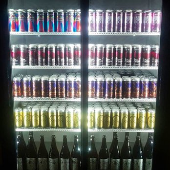 Torchlight Brewing - a refrigerator full of cans of beer - Breweries Near Me - Nelson, British Columbia Torchlight Brewing - a refrigerator full of cans of beer - Breweries Near Me - Nelson, British Columbia