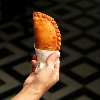 Mercado Buenos Aires - Traditional Argentine empanada, freshly baked until golden and perfect for a quick meal or snack. - Delis Near Me - Granada Hills, California Mercado Buenos Aires - Traditional Argentine empanada, freshly baked until golden and perfect for a quick meal or snack. - Delis Near Me - Granada Hills, California