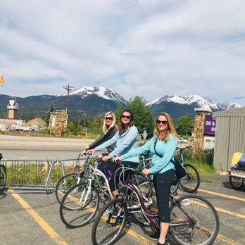 Lake Dillon Liquors - three women on bicycles in a parking lot - Beer, Wine & Spirits Near Me - Dillon, Colorado