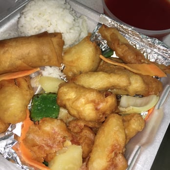 China Cafe - Sweet and Sour Chicken, lunch combo comes with a spring roll. I opt for white rice every time! (And only 1 scoop) - Chinese Near Me - Chantilly, Virginia