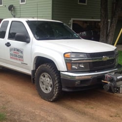 City Automotive Services - Service truck fully equipped for roadside assistance and winch outs.